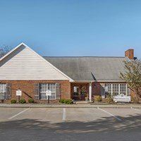 Small building with parking lot 